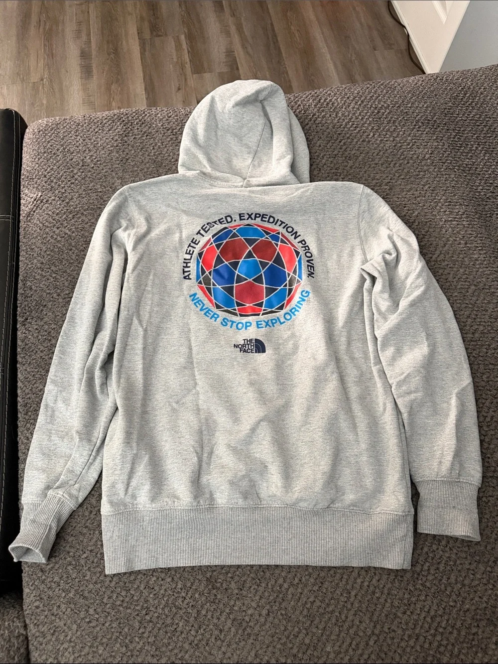The North Face Light Gray Hoodie with Red & Blue Globe Graphic